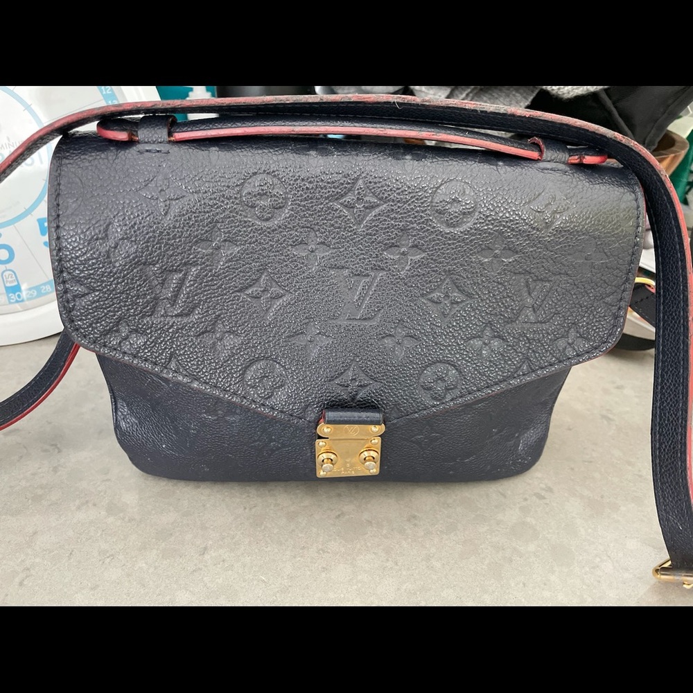 Blue and red Louis Vuitton Métis pochette